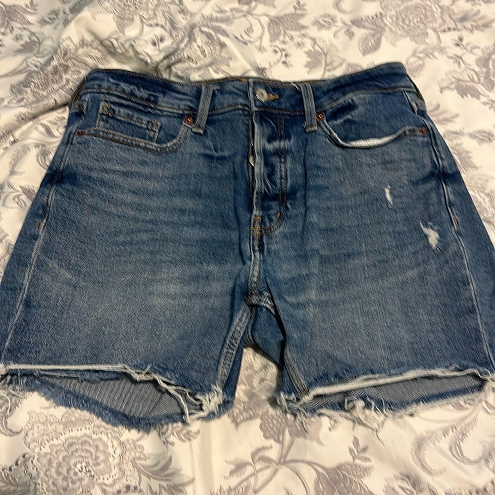 Old Navy denim cutoffs. 5” inseam. Straight fit through hip & thigh.